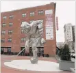  ?? BETH J. HARPAZ/THE ASSOCIATED PRESS ?? The Iron Man sculpture of a hockey player next to the Prudential Center, where the New Jersey Devils hockey team plays in Newark.