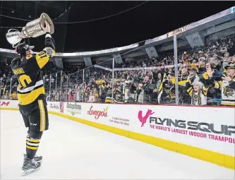  ?? GARY YOKOYAMA HAMILTON SPECTATOR FILE PHOTO ?? Hamilton forward Nicholas Caamano shows off the J. Ross Robertson Cup to Bulldogs fans this past May. Expect the defending champs to take a step back this season as they begin to rebuild.