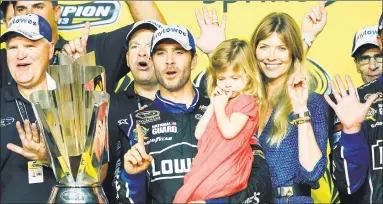  ?? Terry Renna / Associated Press ?? Jimmie Johnson, center, announced Wednesday that 2020 will be his final season of fulltime racing.