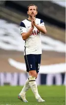  ??  ?? Harry Kane applauds the fans after Tottenham’s defeat by Aston Villa on Wednesday night