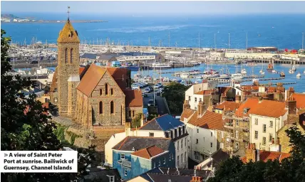  ??  ?? A view of Saint Peter Port at sunrise. Bailiwick of Guernsey, Channel Islands