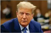  ?? MICHAEL M. SANTIAGO — POOL PHOTO VIA AP ?? Former President Donald Trump awaits the start of proceeding­s on the second day of jury selection at Manhattan criminal court Tuesday.