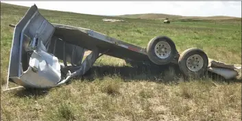  ?? Photos contribute­d by Jan Linthicum ?? The skies were volatile in southwest Saskatchew­an on July 10, with multiple tornadoes touching down, including at Jan and Murray Linthicum's ranch south of Glentworth where grain bins and other equipment were lifted and carried away.