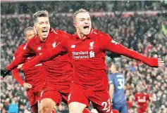  ?? Photo — Reuters ?? Liverpool's Xherdan Shaqiri celebrates scoring their third goal against Manchester United during their Premier League match at Anfield in Liverpool December 16, 2018.
