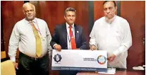  ??  ?? Former CILT Sri Lanka Chairman Rohaan Abeywikram­a, Shippers’ Academy Colombo CEO and CIMC Events Founder Rohan Masakorala with Speaker Karu Jayasuriya at the ceremony handing over the official logo