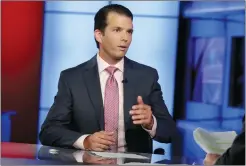  ?? AP PHOTO RICHARD DREW ?? Donald Trump Jr. is interviewe­d Tuesday by host Sean Hannity on his Fox News
Channel television program, in New York. A Russian-American lobbyist says he attended a June 2016 meeting with President Donald Trump’s son, marking another shift in the...