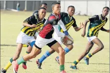  ?? Picture: BRIAN WITBOOI ?? STRONG PRESENCE: PE North’s Chadwin Abrahams on a run against Koukamma during their Vuka tournament game at the Zwide Stadium at the weekend