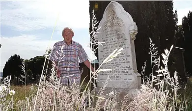  ??  ?? Untidy mess: Stanley McColl beside his family grave, which is being overgrown by grass