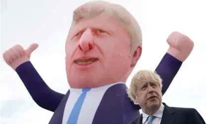  ?? Photograph: Ian Forsyth/Getty Images ?? ‘Mr Johnson’s woeful lack of consistenc­y is being resolved slowly by Brexit.’ Boris Johnson with a blimp in Hartlepool on 7 May.