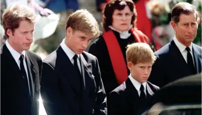  ??  ?? Public grief: Diana’s brother, Earl Spencer, alongside William, Harry and their father Charles