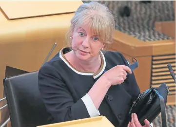  ?? ?? NEW LEGISLATIO­N: Housing Secretary Shona Robison at the Scottish Parliament.