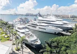  ?? MIKE STOCKER/SOUTH FLORIDA SUN SENTINEL ?? The 2019 Fort Lauderdale Internatio­nal Boat Show was the 60th anniversar­y of the largest in-water boat show in the world. The event will be downsized for its return.