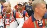  ?? PATRICK SEMANSKY/ASSOCIATED PRESS ?? Members of the Russian Olympic delegation arrive at Rio de Janeiro Internatio­nal Airport last week.