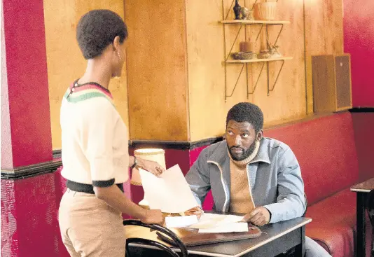  ?? DES WILLIE/AMAZON PRIME VIDEO VIA AP ?? This image released by Amazon Prime Video shows Letitia Wright (left) as Altheia Jones-LeCointe, and Malachi Kirby as Darcus Howe in a scene from ‘Mangrove’.