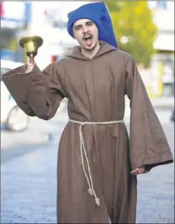  ?? Picture: Andy Jones FM4975334 ?? Barnaby Simmons dressed as 15th century German monk Martin Luther in Jubilee Square, Maidstone