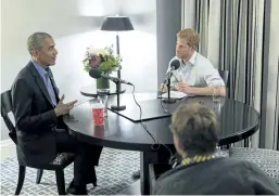  ?? KENSINGTON PALACE COURTESY OF THE OBAMA FOUNDATION VIA AP ?? Britain’s Prince Harry, right, interviews former U. S. President Barack Obama as part of his guest editorship of BBC Radio 4’ s Today program. The interview was recorded in Toronto in September during the Invictus Games.