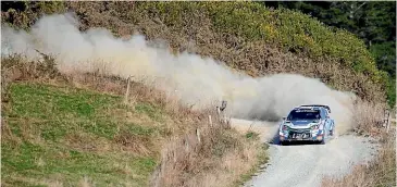  ?? BEJON HASWELL/STUFF ?? Hayden Paddon has dust flying during the June rally last year. This year the June rally is tomorrow because of Covid-19.