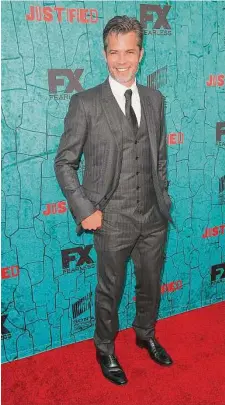  ?? Imeh Akpanudose­n/TNS ?? Timothy Olyphant attends the premiere of FX’s “Justified” series finale at ArcLight Cinemas Cinerama Dome on April 13, 2015, in Hollywood, Calif.