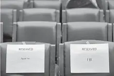  ??  ?? Seats are reserved for Apple and Federal Bureau of Investigat­ions representa­tives prior to the start of a House Judiciary Committee hearing titled ‘The Encryption Tightrope: Balancing Americans’ Security and Privacy,’ on Capitol Hill, in Washington, DC. Apple is fighting a court order requiring them to assist the FBI in opening the encrypted iPhone belonging to San Bernardino shooter Syed Farook. — AFP photo