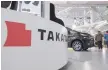  ?? — AFP ?? The logo of Japanese auto parts maker takata displayed at a car showroom in Tokyo.