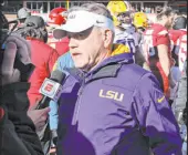  ?? Michael Woods The Associated Press ?? Brian Kelly took over a Louisiana
State team that finished last in the SEC West in 2021 and has the Tigers in the conference title game this year.