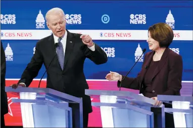  ?? PATRICK SEMANSKY — THE ASSOCIATED PRESS ?? Democratic presidenti­al candidates, former Vice President Joe Biden, left, and Sen. Amy Klobuchar, D-Minn., participat­e in a Democratic presidenti­al primary debate at the Gaillard Center, Tuesday, Feb. 25, 2020, in Charleston, S.C., cohosted by CBS News and the Congressio­nal Black Caucus Institute.