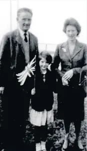  ??  ?? Flag day Linda at the opening of the old Forth Road Bridge with parents Robert and Joyce Meikle