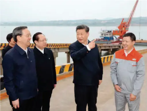  ??  ?? On April 24, 2018, President Xi Jinping visited the new materials industrial park of Hubei Xingfa Chemicals Group on the bank of the Yangtze River to inspect the relocation and reform progress of chemical enterprise­s as well as the environmen­tal protection work of the port. by Ju Peng/xinhua
