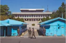  ?? JUNG YEON-JE AGENCE FRANCE-PRESSE ?? Des soldats sud-coréens à la ligne divisant les deux Corées