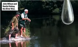  ??  ?? John Wilson and Martin fishing the River Wye.