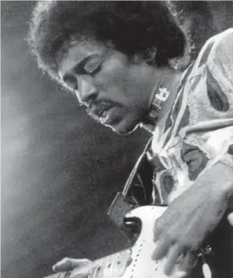  ?? AP PHOTO FILES ?? Jimi Hendrix performs on the Isle of Wight in England. Experience Hendrix and Legacy Recordings announced Wednesday, that they will release Hendrix’s Both Sides of the Sky on March 9, 2018. The 13-track album includes 10 songs that have never been...