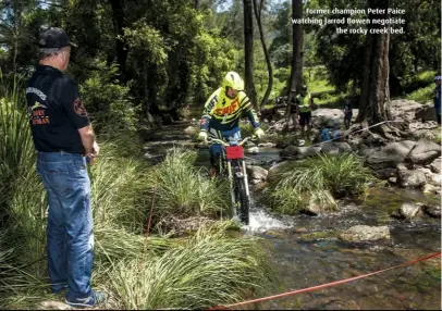  ??  ?? Former champion Peter Paice watching Jarrod Bowen negotiate the rocky creek bed.