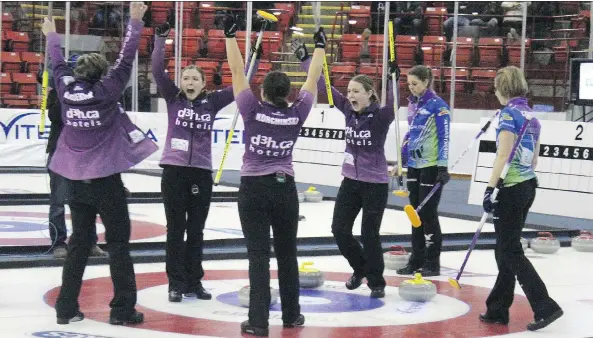  ?? MICHAEL OLEKSYN/MELFORT JOURNAL. ?? Sherry Anderson’s team celebrates their win at the 2018 Saskatchew­an Scotties curling tournament in Melfort on Sunday.