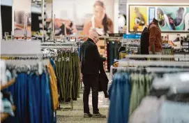  ?? Seth Wenig/Associated Press ?? Clothing prices are up 0.6% after three months of declines, the Labor Department says. Prices overall rose 0.4% from January to February.