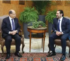  ??  ?? LEBANESE PRESIDENT Michel Aoun (left) meets yesterday at the presidenti­al palace in Baabda with Prime Minister Saad Hariri.