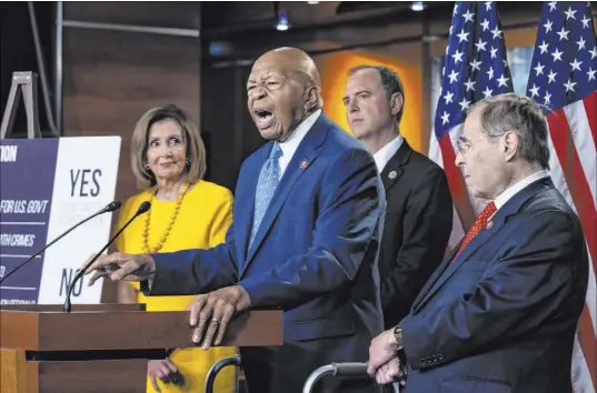  ?? J. Scott Applewhite The Associated Press ?? Rep. Elijah Cummings, D-Md., center, takes part in a news conference Wednesday in Washington along with, from left, House Speaker Nancy Pelosi, D-Calif., and Reps. Adam Schiff, D-Calif., and Jerry Nadler, D-N.Y.