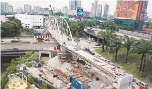  ??  ?? One of two bridges being built to improve the motorcycle lanes along the Federal Highway.