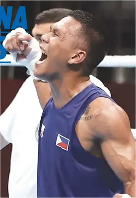  ?? / TV5.ESPN.COM ?? ■ TAMBAG: Gitambagan ni boxing legend Manny Pacquiao ang kababayang si Eumir Marcial (Naa sa hulagway) nga magtutok una sa Olympics sa di pa mosaka sa profession­al rank, matod ni Abap president Ricky Vargas.