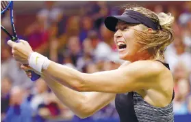  ?? AP FOTO ?? OUSTED. Former U.S. Open champion Maria Sharapova was eliminated in the fourth round of the U.S. Open after losing to Carla Suarez Navarro.