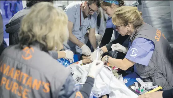  ?? PHOTO COURTESY OF SAMARITAN’S PURSE ?? A Calgary doctor shared his experience treating people near Mosul, Iraq, injured in the conflict between Islamic militants and government forces.
