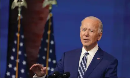  ?? Photograph: Susan Walsh/AP ?? Joe Biden’s trade representa­tive will inherit a trade war with China, put on pause by an interim trade pact that left many of the hardest issues unresolved.
