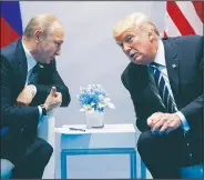  ?? AP/EVAN VUCCI ?? President Donald Trump speaks Friday during a meeting with Russian President Vladimir Putin at the G20 Summit in Hamburg.