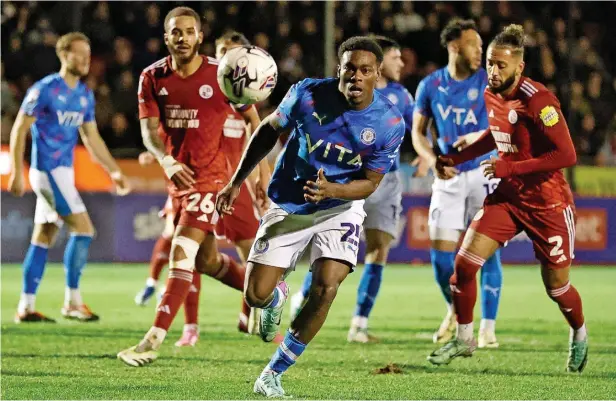  ?? Www.mphotograh­ic.co.uk ?? ●●Isaac ‘Tanto’ Olaofe chases the ball during County’s 1-1 draw against Crawley Town at the Broadfield Stadium on Monday