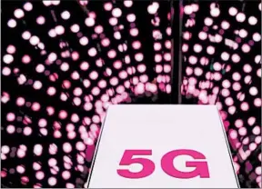  ?? PAU BARRENA/GETTY-AFP ?? The wireless industry is lobbying lawmakers in an effort to pre-empt local zoning laws and speed up its 5G deployment. The lobbying efforts have alarmed local officials across the country.