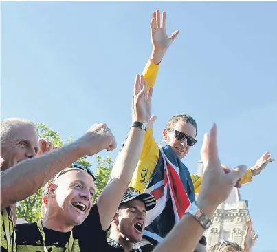  ?? Picture: AP. ?? Sir Bradley Wiggins celebrates his Tour de France victory on July 22 2012.