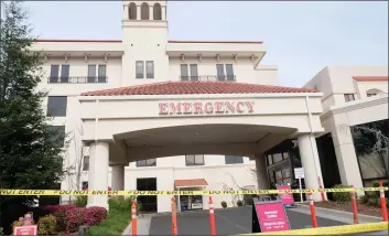  ?? CAMILLE VON KAENEL — ENTERPRISE-RECORD FILE ?? Enloe Medical Center’s emergency entrance is cordoned off March 6, 2020, as hospital staff practice screening patients with respirator­y ailments in preparatio­n of the COVID-19pandemic in Chico.