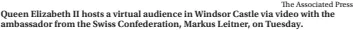  ?? The Associated Press ?? Queen Elizabeth II hosts a virtual audience in Windsor Castle via video with the ambassador from the Swiss Confederat­ion, Markus Leitner, on Tuesday.
