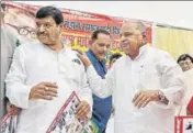  ?? AP ?? Samajwadi Party founder Mulayam Singh Yadav (right) with his brother Shivpal Yadav during an event in Lucknow on Friday.
