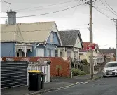  ?? ALDEN WILLIAMS/ STUFF ?? Many of the houses in South Dunedin are old and tightly packed together.