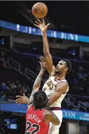  ?? TONY DEJAK PHOTOS / AP ?? “His understand­ing of the game and where to be and what’s next is phenomenal,” coach J.B. Bickerstaf­f said of their top pick Evan Mobley, the 7-foot center/forward from USC.